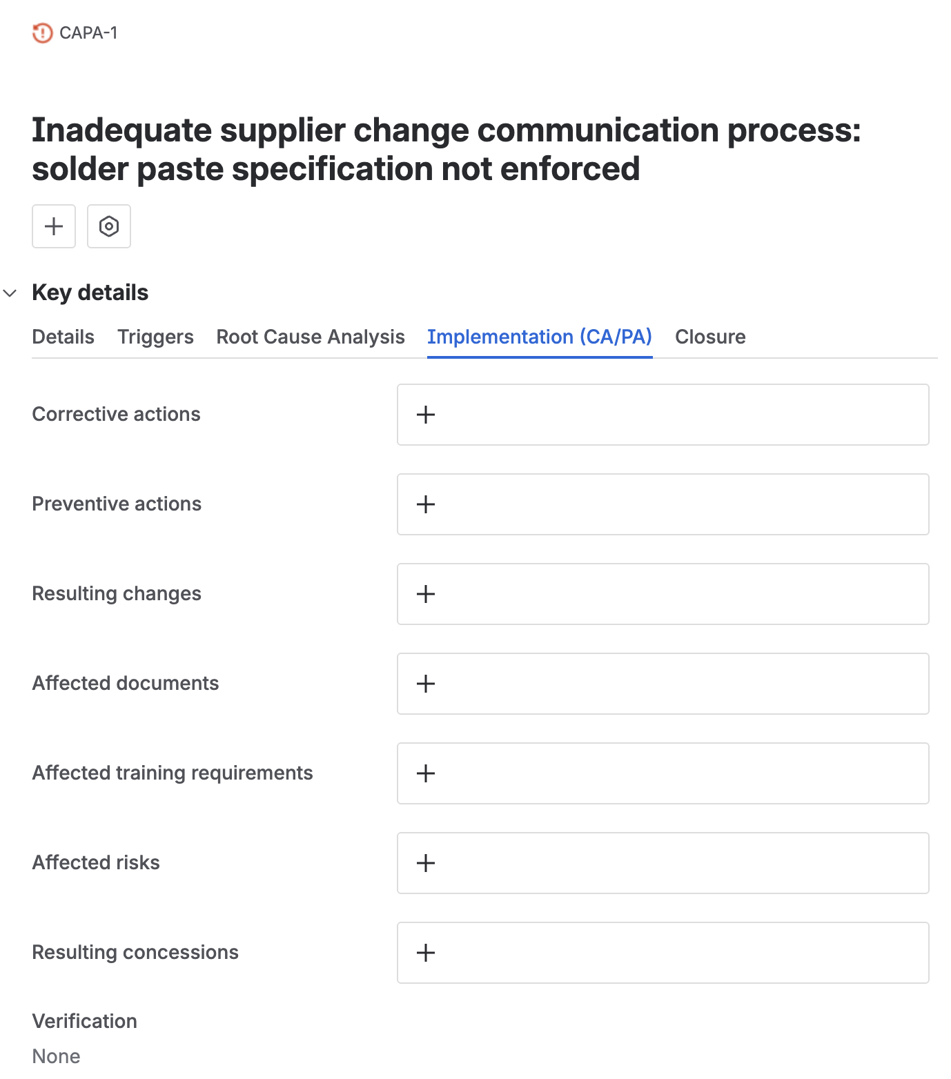 The implementation tab’s link fields for resulting changes, affected documents, affected training requirements, affected risks, and resulting concessions, each still empty.